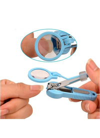 NAIL CLIPPER WITH MAGNIFYING GLASS